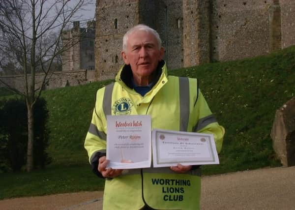 Peter with his certificates