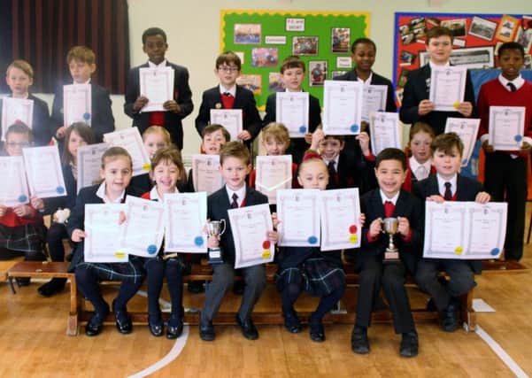 Charters Ancaster Preparatory School children with their certificates