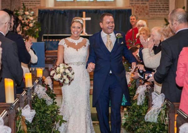 Rusper couple, Emma and James O'Malley supported St Catherine's Hospice on their wedding day - by hosting a bar in memory of the bride's father, Nevill. It raised  an amazing ?1,745.20 for the local hospice. Photo credit: Sam Wordie - www.wordiephotography.com Zj9DKKBF9SKz0ftYFfQS