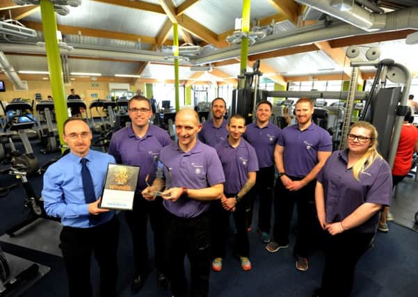 ks16000517-1 
Staff at  Westgate Leisure, Chichester, with the Observer Gym of the Year award