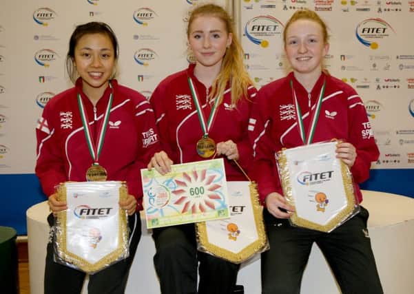 Table tennis star Kate Cheer wins a gold medal for Emgland Junior Girls team at the Italian Youth Open at Lignano. From left - Tin-Tin Ho, Kate Cheer and Emily Bolton. Picture courtesy of the ITTF SUS-160316-181731002