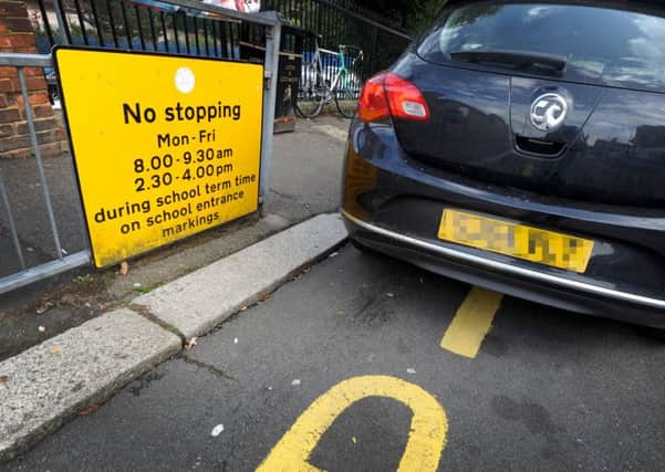 People parking outside schools was one problem highlighted by the consultation