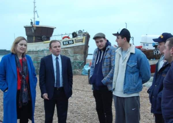 Amber Rudd MP and Fisheries minister George Eustice meeting fishermen in Hastings in February, 2015.