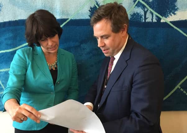 Horsham MP Jeremy Quin with rail minister Claire Perry last year