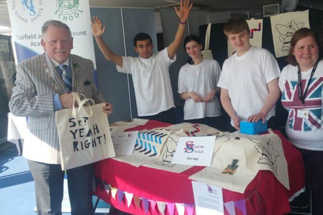 Rother District Council chairman Jimmy Carroll with students from Torfield and Saxon Mount Schools at the Checkatrade.com Expo 2016