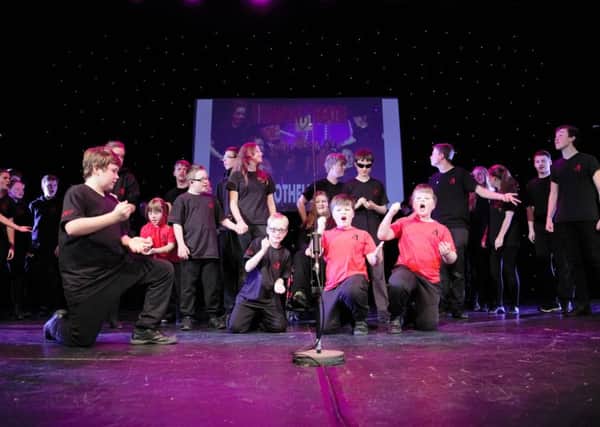 The Ariel Company Theatre Othellos Buddies, won the Crawley Community Awards category for Volunteer Group. Pictured with the Othellos performing at the West Sussex County Times Community Awards 2015.  - picture by Josh Smith for SMedia Group1