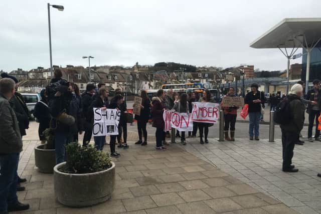 Protestors outside Sussex Coast College after the transport summit