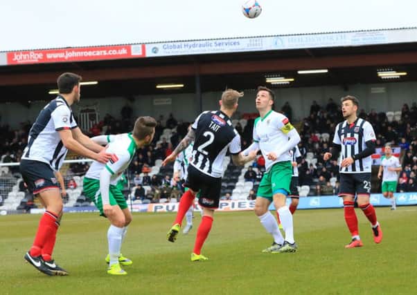Jason Prior and Ollie Pearce put Grimsby under pressure at Blundell Park / Picture by Tim Hale