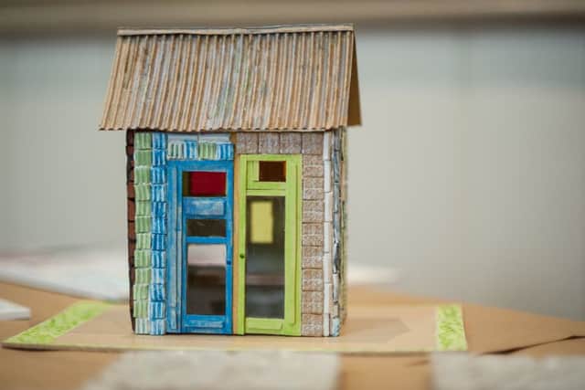 The ceramic beach hut designed by students of Sussex Downs College and artist Sheila Hay SUS-160321-092130001