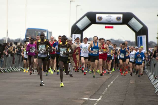 Runners set off in the 32nd Hastings Half Marathon yesterday morning. Picture courtesy Frank Copper (SUS-160321-070406001)
