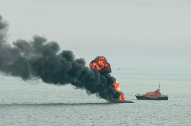 A burning boat has exploded and sunk after flames spread to gas canisters in the hold SUS-160321-143025001