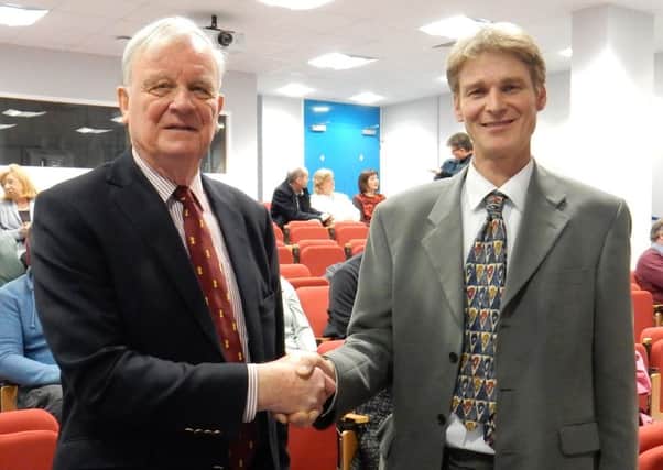 John Tripcony, left, with new chairman Paul Campbell