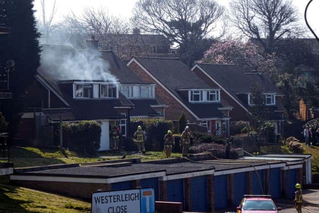 Smoke coming from the first floor in a house on Westerleigh Close, St Leonards. Photo by Mick Bean