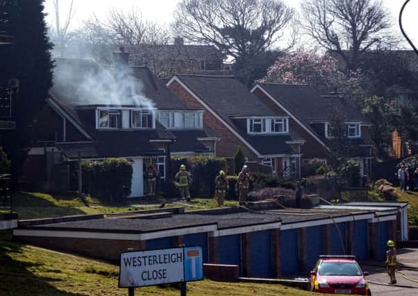 Smoke coming from the first floor in a house on Westerleigh Close, St Leonards. Photo by Mick Bean