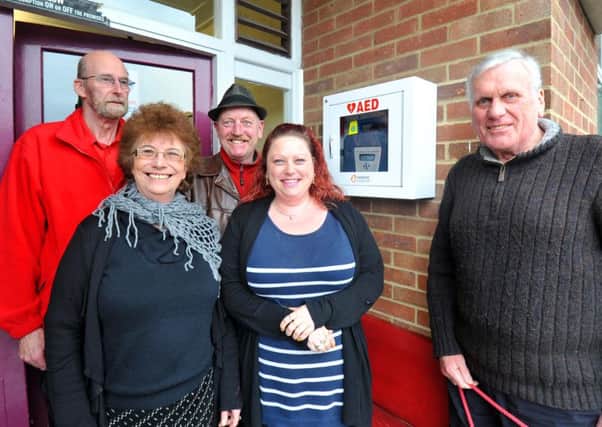 25/3/14- Steve and Julie Goodfellow with members of Pebsham Community Centre with the Defibrillator that has been installed there. SUS-140325-171612001