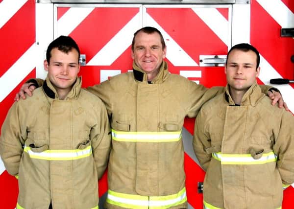 Tom Williams (pictured right) joins his dad Rick and twin brother Stuart as a retained firefighter at Bognor Fire Station