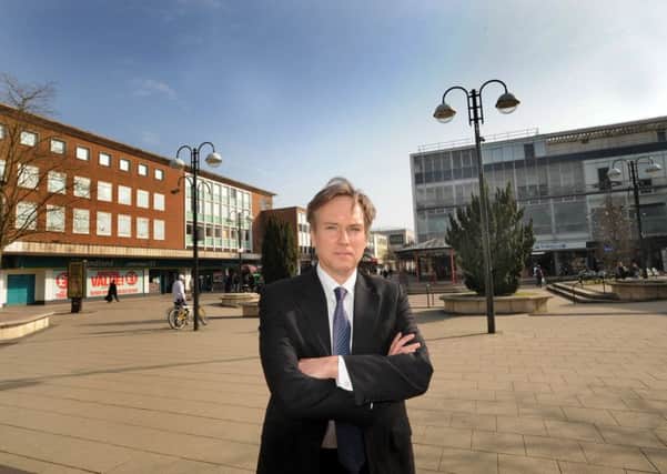 jpco-12-3-14 Crawley MP, Henry Smith, has branded the image of Queens Square as not being good enough for the standard local consumers and shoppers visiting the town should expect. (Pic by Jon Rigby) SUS-141003-105934001
