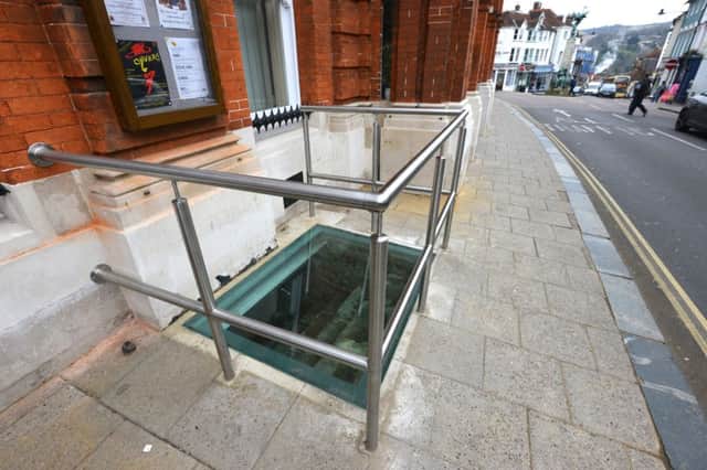 New railing and window around Lewes Town Hall cellar steps SUS-160323-231440008