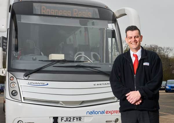 National Express driver Dominic Morgan with the Bognegg Regis coach for Easter Sunday