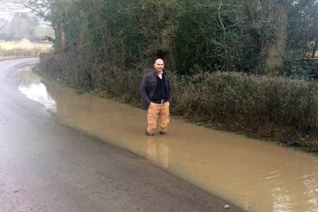 A massive pothole measuring 10ft long and more than a foot deep near Framfield, East Sussex. Photo by SWNS. SUS-160324-164700001