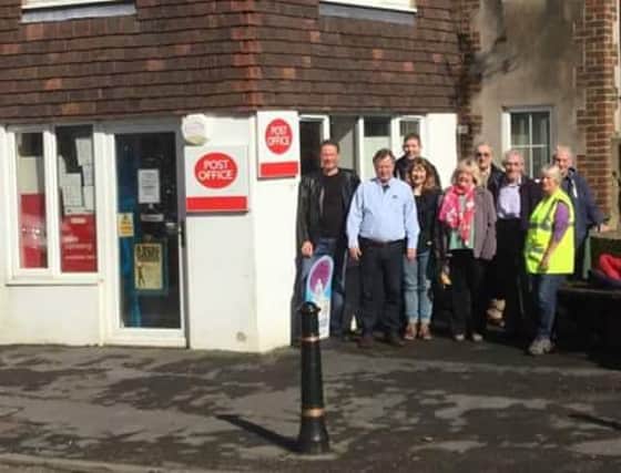 Cllr David Barling and parish councillors outside Upper Beeding post office SUS-160325-151525001