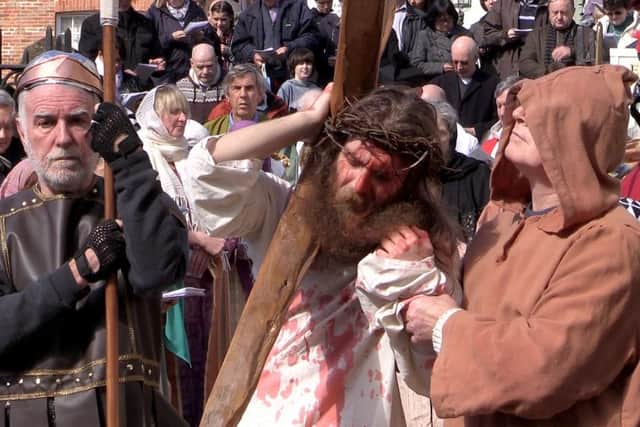 Re-enactment of Christ's crucifixion in Hastings Old Town. Photo taken from the video. SUS-160326-115458001