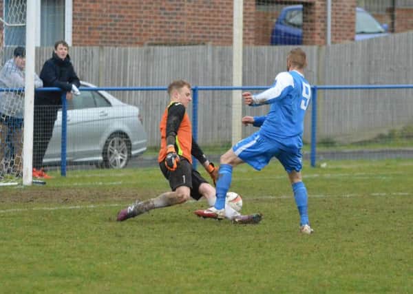 Max Miller goes round the keeper. Picture by Grahame Lehkyj