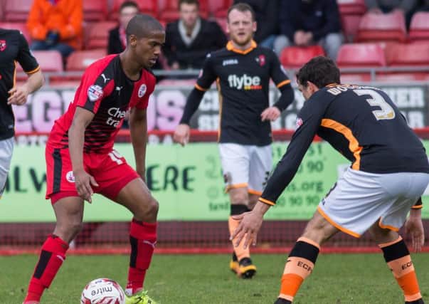 Lewis Young takes on a defender for Crawley Town against Exeter City, 28th March 2016. (c) Jack Beard SUS-160328-173758008