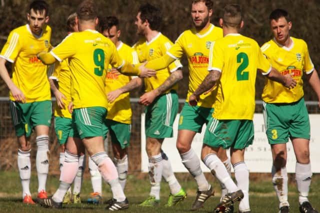 Sidlesham celebrate one of their goals v Selsey / Picture by Chris Hatton