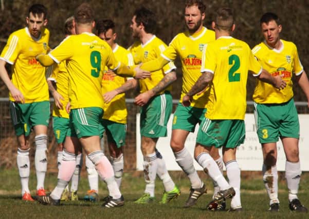 Sidlesham celebrate one of their goals v Selsey / Picture by Chris Hatton