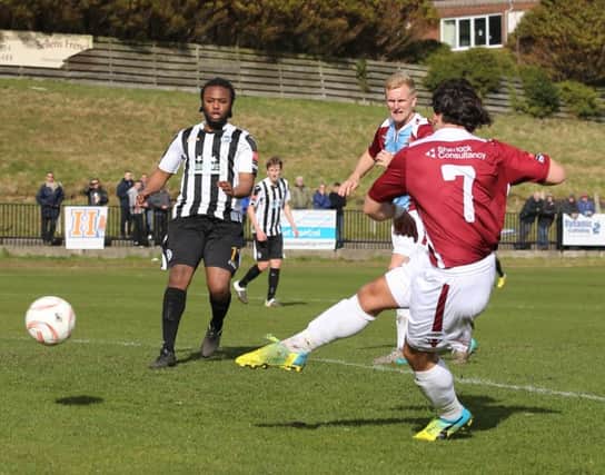 Billy Medlock scores his fourth goal against Peacehaven & Telscombe. Picture courtesy Scott White