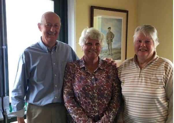 Jean and Peter received their prizes from Ladies Captain Maggie Neve (pictured, centre).