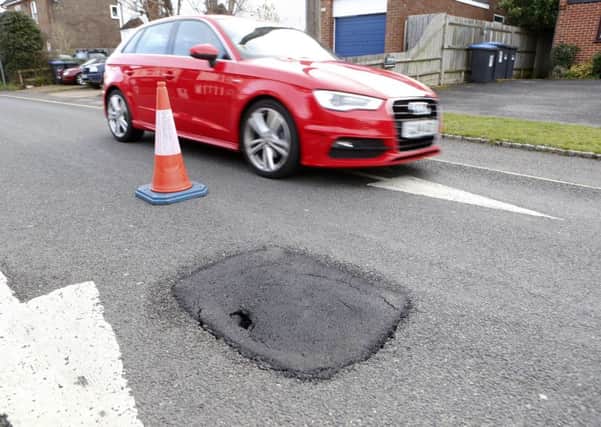A sink hole opened up in Mill Road, Burgess Hill