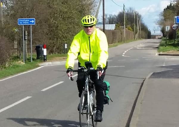 John Bates is cycling around the UK coast and is passing through 1066 country on Sunday (April 3)