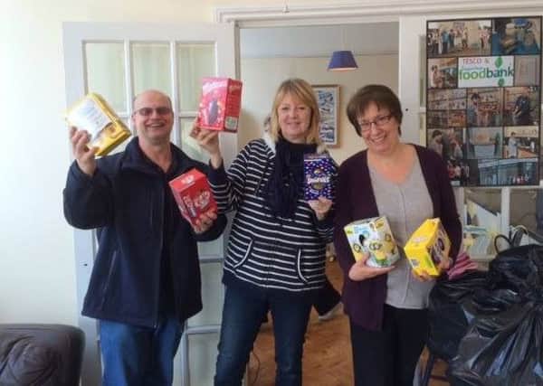 Spirit FM presenter Ian Crouch along with volunteers at Bognor foodbank who are benefitting from the radio stations Easter egg appeal.