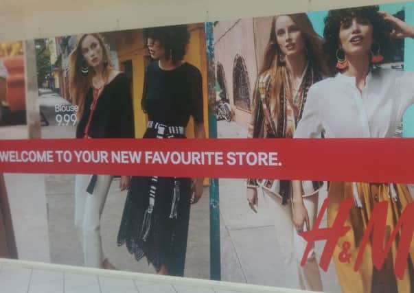 Posters around new H&M store in Swan Walk