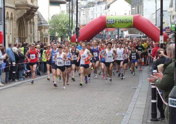 Competitors set off in last year's Hastings Runners Five-Mile Race outside the town hall