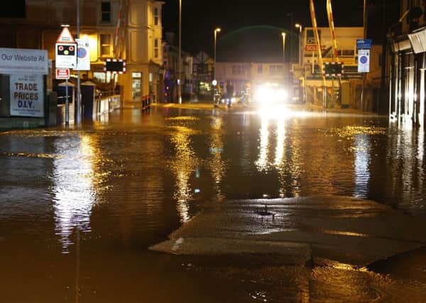 The scene after the water main, in Westcourt Road, Worthing, burst. Picture by Eddie Mitchell