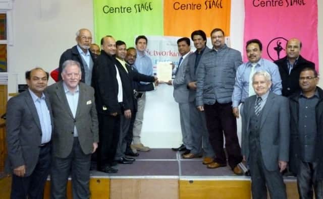 Indian restaurant owners from Bexhill and Rother with a petition to be presented to the Home Office SUS-160413-095614001