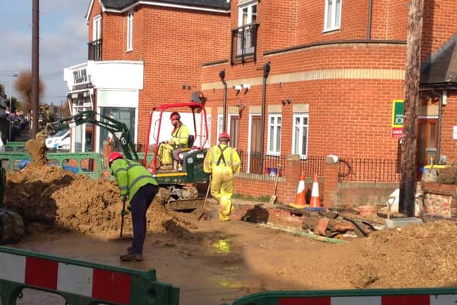 Repair works by Southern Water are underway after a pipe burst on Westcourt Road, Worthing