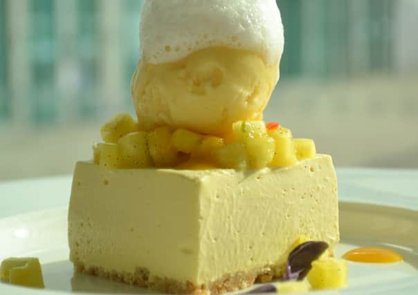 Mango mousse served with pineapple and chilli crush,  sorbet and Malibu foam