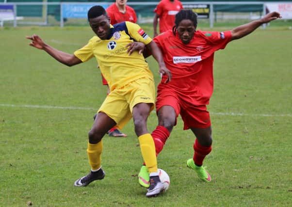 Bright Temba tussles for possession during Hastings United's 1-1 draw away to South Park on Saturday. Picture courtesy Joe Knight