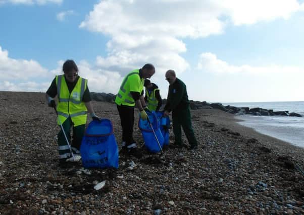 Adur and Worthing councils' park and foreshores team are cleaning the coastline