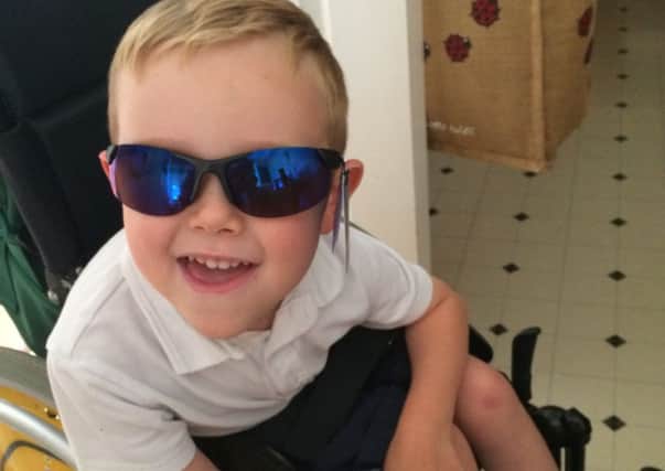 Jake Bourlet, five, hopes the SDR operation will help him to be able to walk