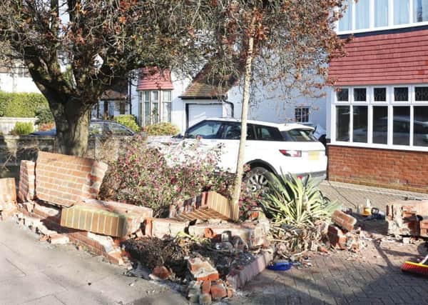 A man has crashed into a garden wall in St Lawrence Avenue. Photo by Eddie Mitchell.