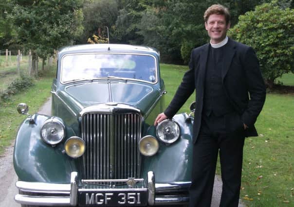 Actor James Norton poses with the SS Mark 5 Jaguar on the set of Grantchester