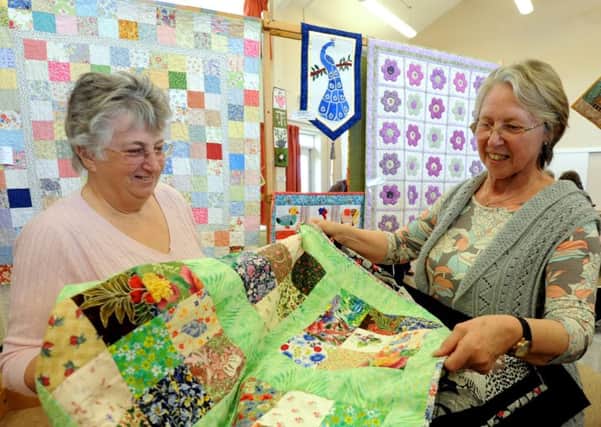 Organisers of the quilting exhibition, Sue Price, left, and Yvonne Hickmore. ks16000552-1