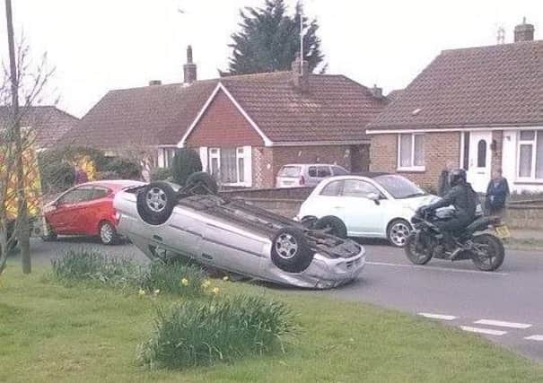 Flipped car in Western Road North, Sompting. Photo submitted by James Watts.