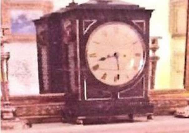 This Regency period bracket clock worth Â£5500 was among the items stolen in the Â£50,000 raid. Picture: Sussex Police
