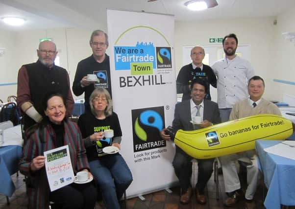 Winners of the Fairtrade breakfasts raffle with Cllr Abud Azad and members of the Bexhill Fairtrade Town committee at Di Paolo's